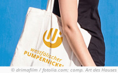 photo: Shopping bag with logo of Westphalian Pumpernickel. © drimafilm / fotolia.com; composition: Art des Hauses